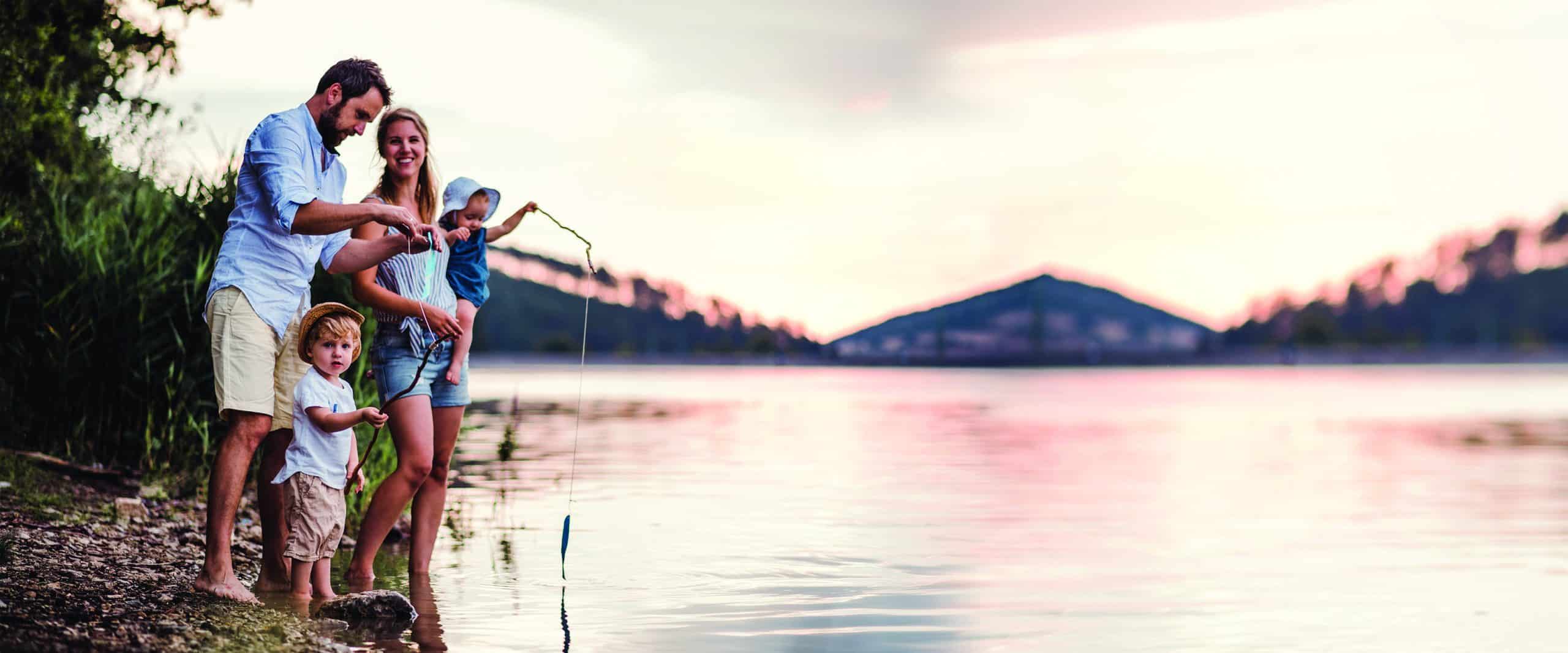 Family at a lake in the evening