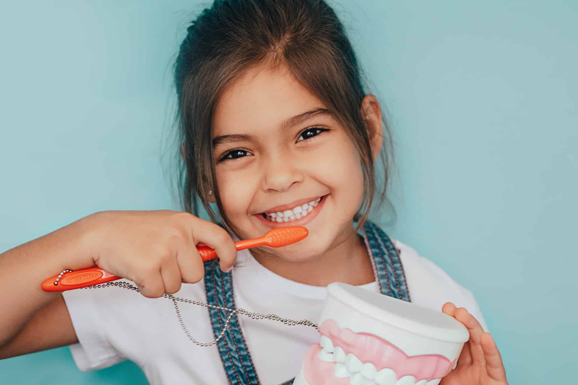 AdobeStock_283354131 v2 Little girl showing of her oral health skills after preventive dental care in Franklin TX
