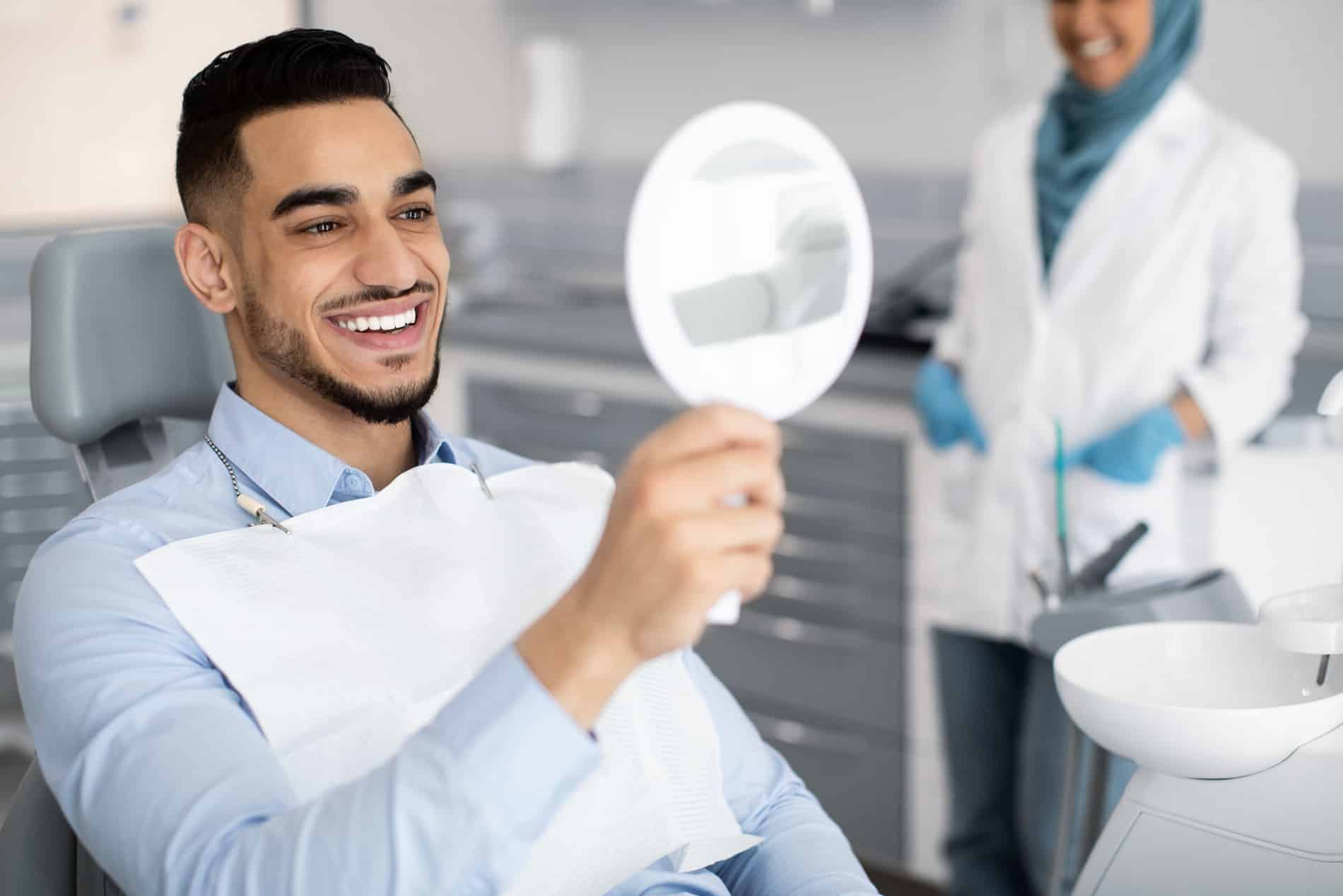 Man at his dental veneers appointment in Franklin TX