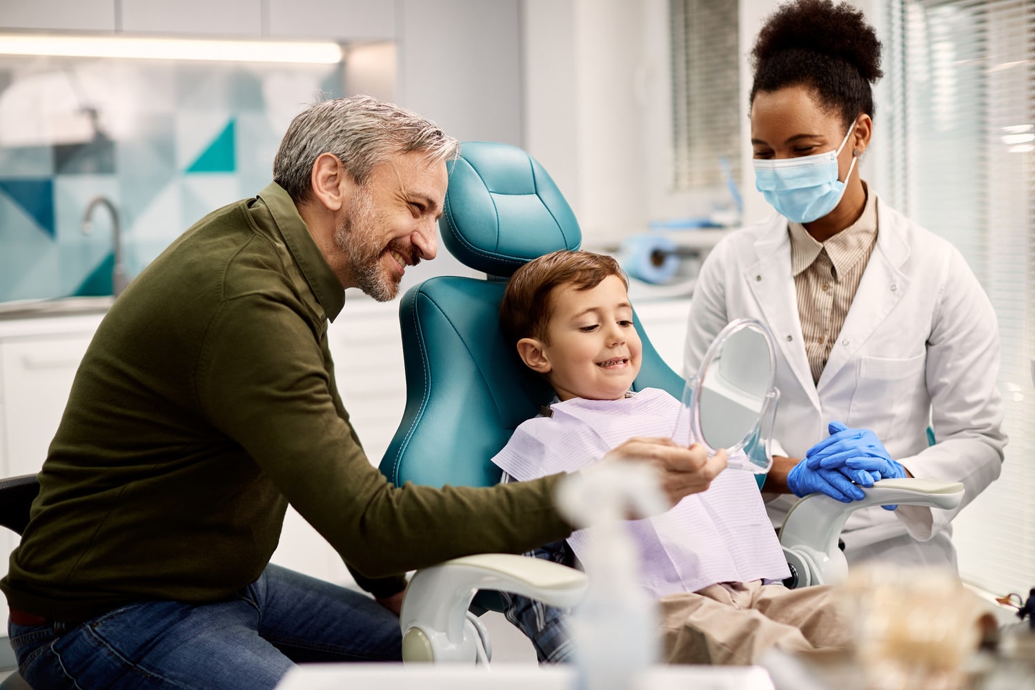Father and son at their first family dental visit in Franklin Tn